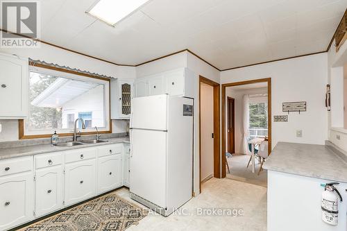 29 Chippewa Crescent, Tiny, ON - Indoor Photo Showing Kitchen With Double Sink