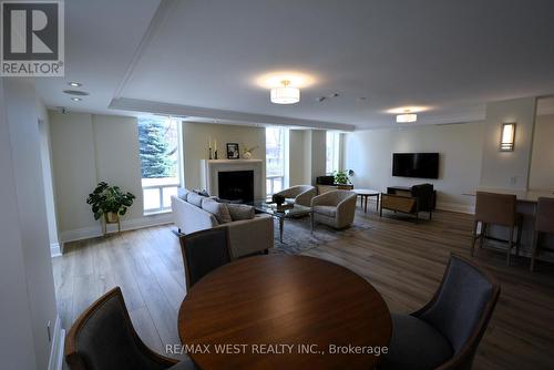 #107 -455 Rosewell Ave, Toronto, ON - Indoor With Fireplace