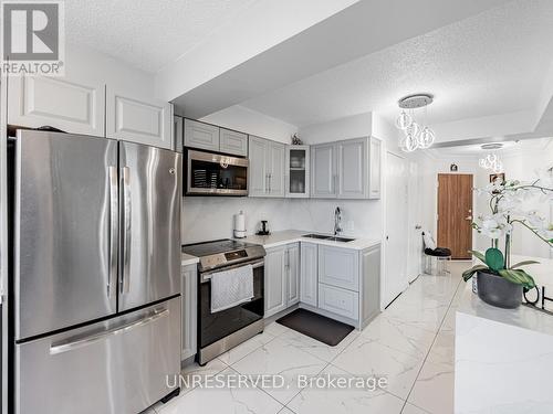 #1403 -2901 Kipling Ave, Toronto, ON - Indoor Photo Showing Kitchen With Double Sink