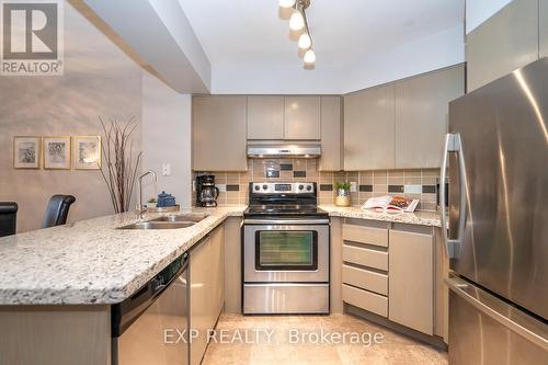 902 - 750 Bay Street, Toronto, ON - Indoor Photo Showing Kitchen With Double Sink
