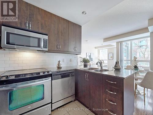 #210 -21 Olive Ave, Toronto, ON - Indoor Photo Showing Kitchen With Double Sink