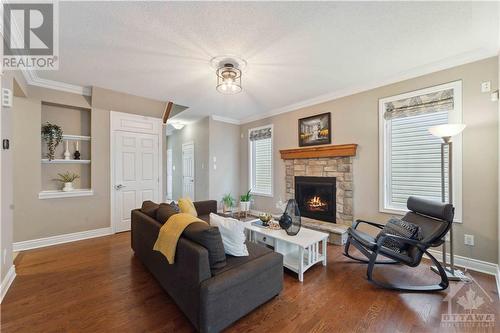 59 Bristling Crescent, Ottawa, ON - Indoor Photo Showing Living Room With Fireplace