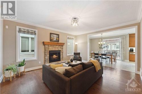 59 Bristling Crescent, Ottawa, ON - Indoor Photo Showing Living Room With Fireplace