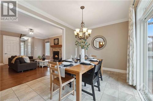59 Bristling Crescent, Ottawa, ON - Indoor Photo Showing Dining Room With Fireplace
