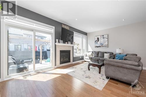754 Putney Crescent, Ottawa, ON - Indoor Photo Showing Living Room With Fireplace