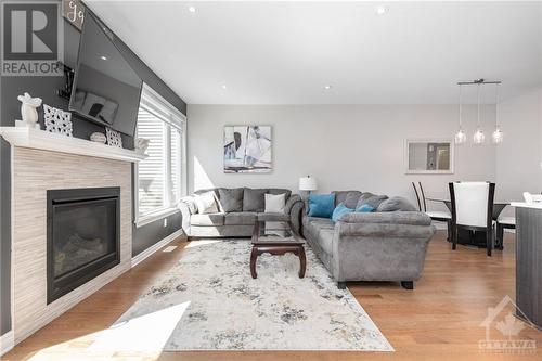 754 Putney Crescent, Ottawa, ON - Indoor Photo Showing Living Room With Fireplace