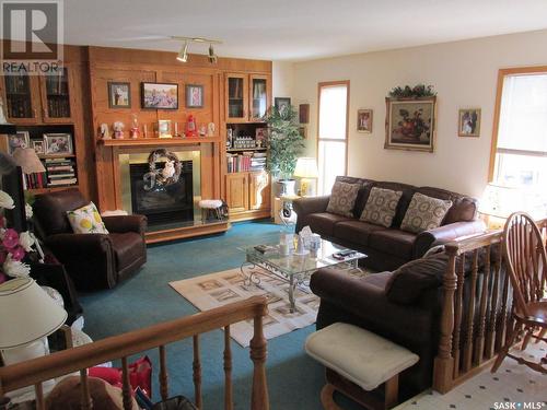 412 9Th Avenue E, Nipawin, SK - Indoor Photo Showing Living Room With Fireplace