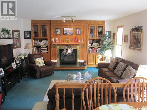 412 9Th Avenue E, Nipawin, SK - Indoor Photo Showing Living Room With Fireplace