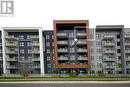 #614 -128 Grovewood Common, Oakville, ON  - Outdoor With Facade 