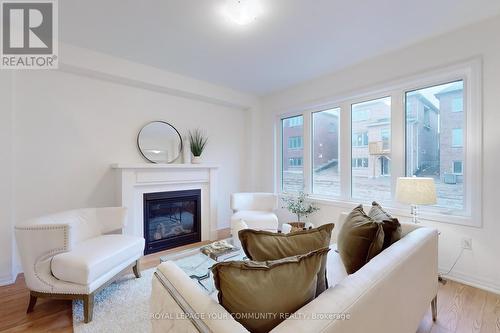 14 Northrop Ave, Clarington, ON - Indoor Photo Showing Living Room With Fireplace