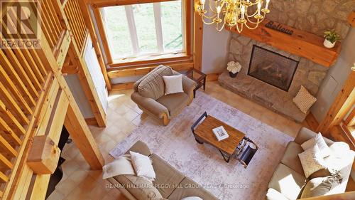 8464 6Th Line, Essa, ON - Indoor With Fireplace