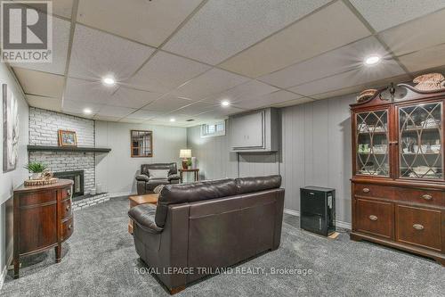 834 Viscount Road, London, ON - Indoor Photo Showing Basement With Fireplace