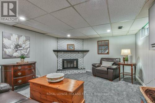 834 Viscount Rd, London, ON - Indoor Photo Showing Basement With Fireplace