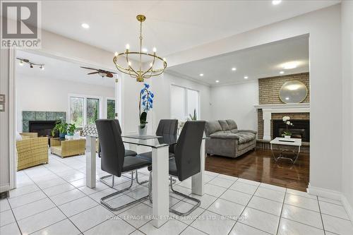 22 Daffodil Cres, Hamilton, ON - Indoor Photo Showing Dining Room With Fireplace