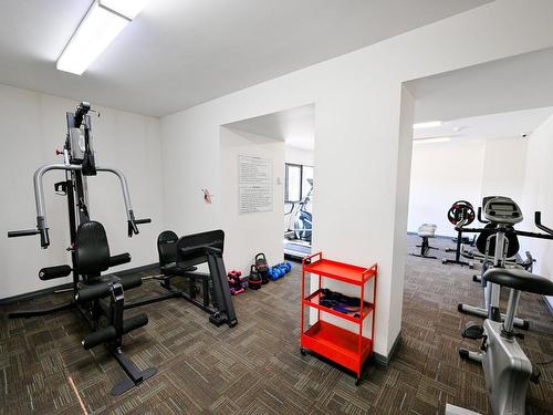 Salle d'exercice - 406-725 Place Fortier, Montréal (Saint-Laurent), QC - Indoor Photo Showing Gym Room