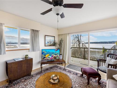 5481 Deep Bay Dr, Bowser, BC - Indoor With Body Of Water