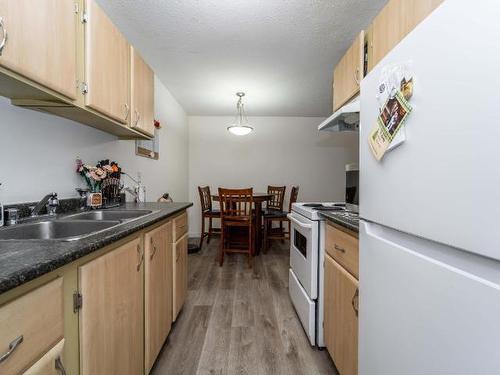 110-555 Dalgleish Drive, Kamloops, BC - Indoor Photo Showing Kitchen With Double Sink