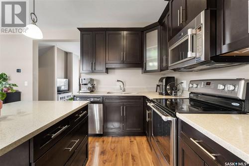 254 Maningas Bend, Saskatoon, SK - Indoor Photo Showing Kitchen With Stainless Steel Kitchen