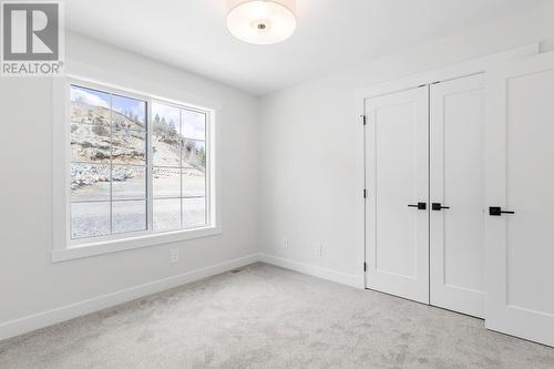 313 Arrowleaf Rise, Coldstream, BC - Indoor Photo Showing Other Room