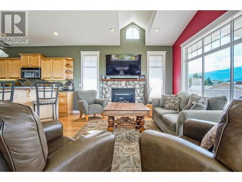 9313 Orchard Ridge Drive, Coldstream, BC - Indoor Photo Showing Living Room With Fireplace