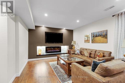 206 Ambleside Dr, London, ON - Indoor Photo Showing Living Room With Fireplace