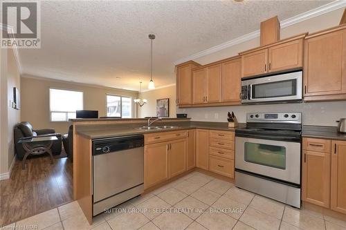 #305 -435 Colborne St, London, ON - Indoor Photo Showing Kitchen With Double Sink
