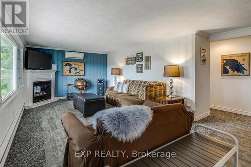304 Champlain Road, Penetanguishene, ON - Indoor Photo Showing Living Room With Fireplace