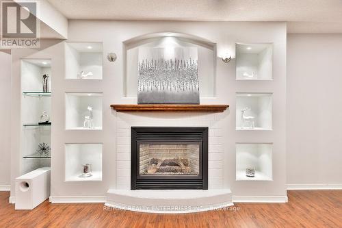 1127 Queen Street W, Mississauga, ON - Indoor Photo Showing Living Room With Fireplace