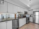 228 - 58 Marine Parade Drive, Toronto, ON  - Indoor Photo Showing Kitchen With Stainless Steel Kitchen With Double Sink 