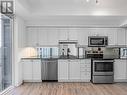 #228 -58 Marine Parade Dr, Toronto, ON  - Indoor Photo Showing Kitchen With Stainless Steel Kitchen 