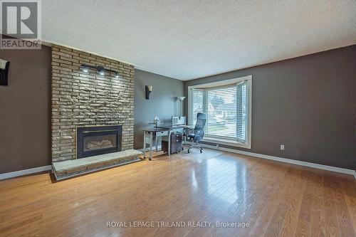 1379 Kostis Ave, London, ON - Indoor Photo Showing Living Room With Fireplace