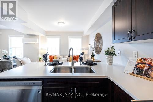 #407 -460 Lonsberry Dr, Cobourg, ON - Indoor Photo Showing Kitchen With Double Sink