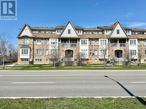 #22 -200 Mclevin Ave, Toronto, ON - Outdoor With Facade