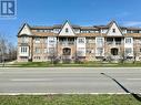 22 - 200 Mclevin Avenue, Toronto, ON  - Outdoor With Facade 