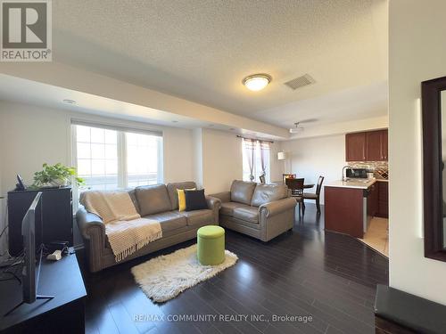 22 - 200 Mclevin Avenue, Toronto, ON - Indoor Photo Showing Living Room