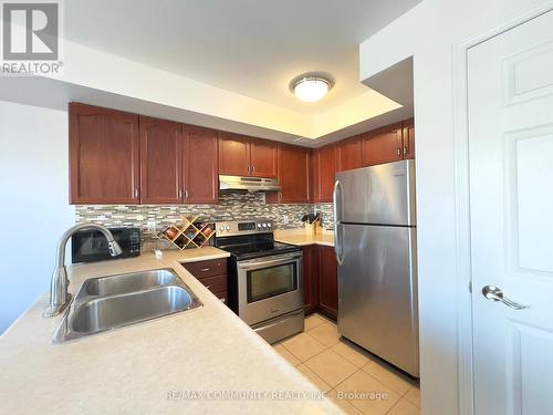 22 - 200 Mclevin Avenue, Toronto, ON - Indoor Photo Showing Kitchen With Double Sink