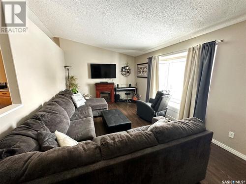 626 Memorial Drive, Spiritwood, SK - Indoor Photo Showing Living Room With Fireplace