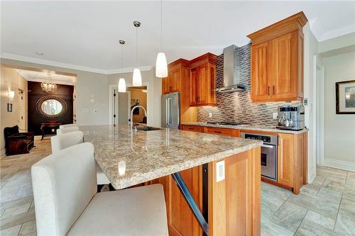 Gorgeous cherry cabinets - 397 King Street W|Unit #104, Dundas, ON - Indoor Photo Showing Kitchen With Upgraded Kitchen