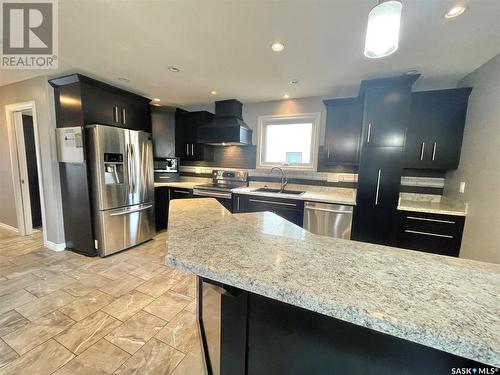 357 7Th Avenue W, Melville, SK - Indoor Photo Showing Kitchen With Upgraded Kitchen