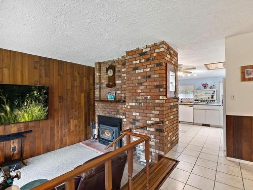 353 Powerhouse Rd, Courtenay, BC - Indoor With Fireplace