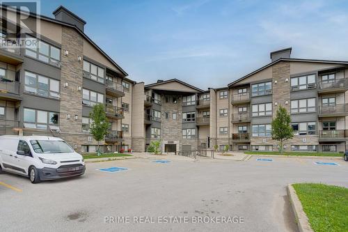 #214 -15 Jacksway Cres, London, ON - Outdoor With Facade
