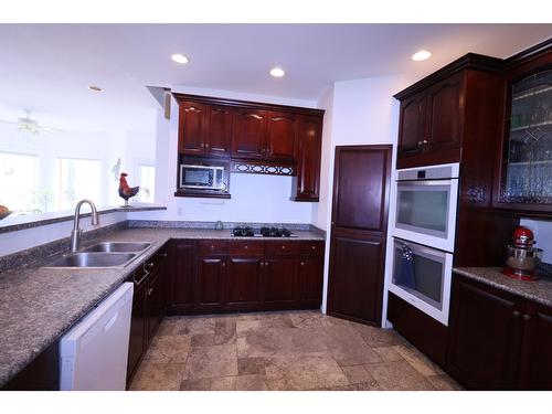 670 Cameron Avenue, Grand Forks, BC - Indoor Photo Showing Kitchen With Double Sink