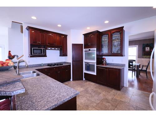 670 Cameron Avenue, Grand Forks, BC - Indoor Photo Showing Kitchen With Double Sink