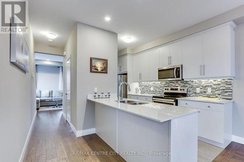 #1 -2070 Meadowgate Blvd, London, ON - Indoor Photo Showing Kitchen With Double Sink With Upgraded Kitchen