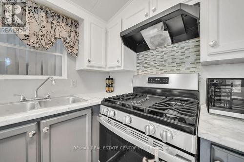 #9 -580 Beaver Creek Rd, Waterloo, ON - Indoor Photo Showing Kitchen With Double Sink With Upgraded Kitchen