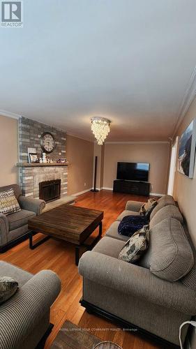 4 Pickett Cres, Richmond Hill, ON - Indoor Photo Showing Living Room With Fireplace