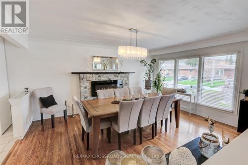 193 Tuxedo Ave S, Hamilton, ON - Indoor Photo Showing Dining Room With Fireplace