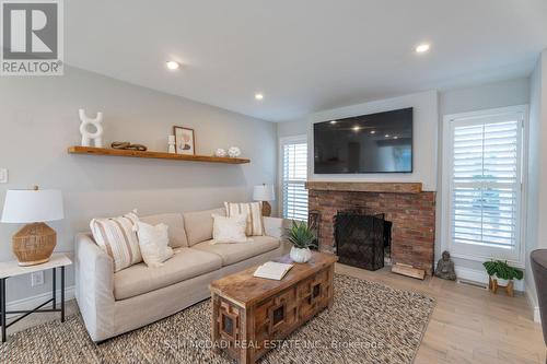 100 Rutledge Road, Mississauga, ON - Indoor Photo Showing Living Room With Fireplace