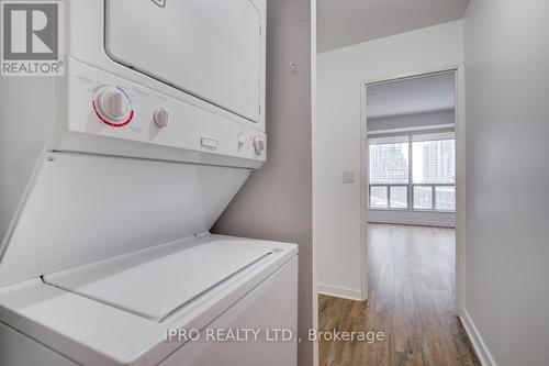 914 - 1 Shaw Street, Toronto, ON - Indoor Photo Showing Laundry Room