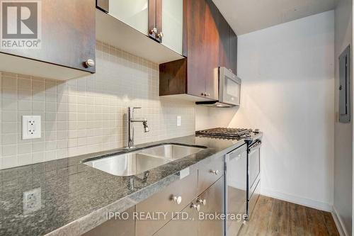 914 - 1 Shaw Street, Toronto, ON - Indoor Photo Showing Kitchen With Double Sink With Upgraded Kitchen